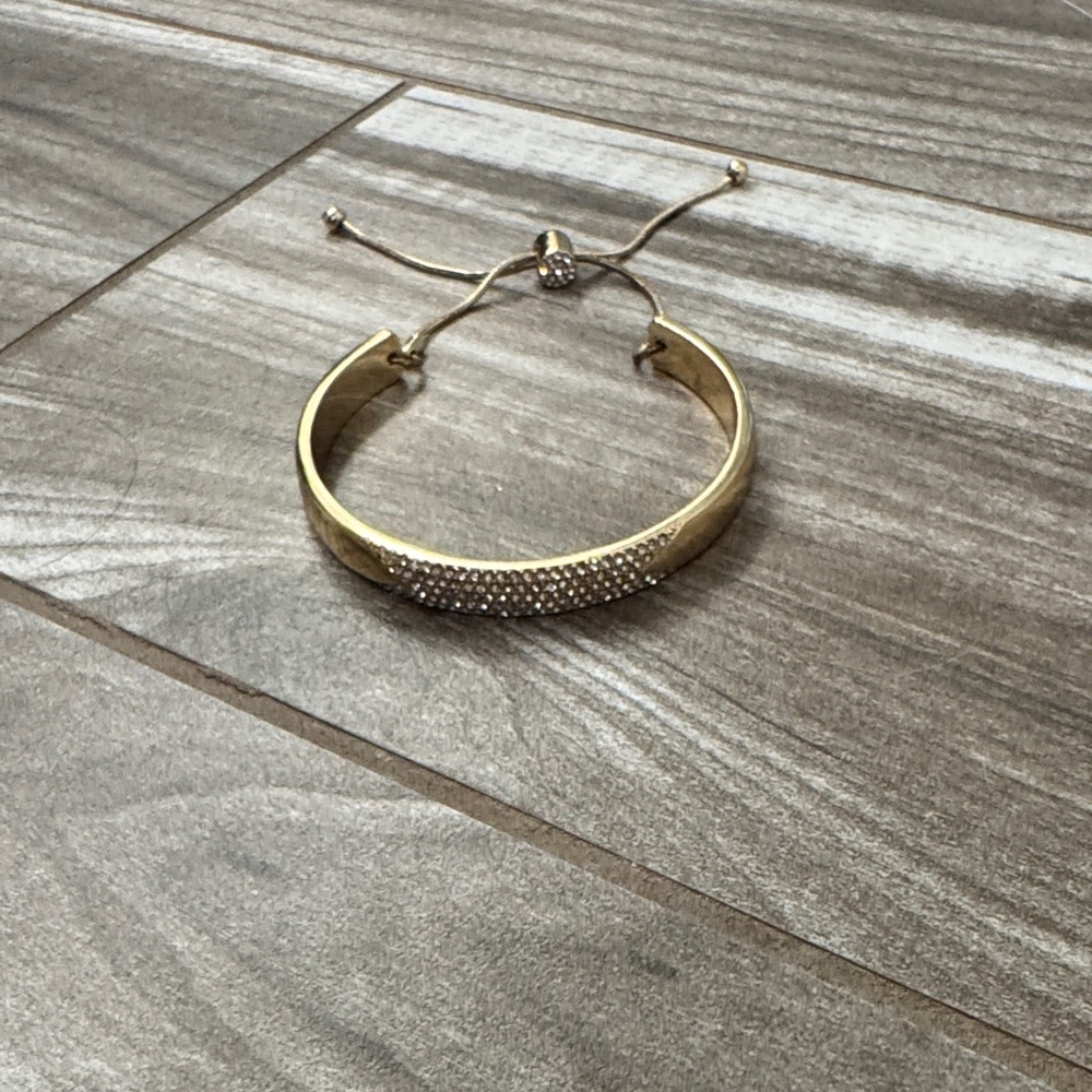Elegant Gold Bracelet with Silver Accents